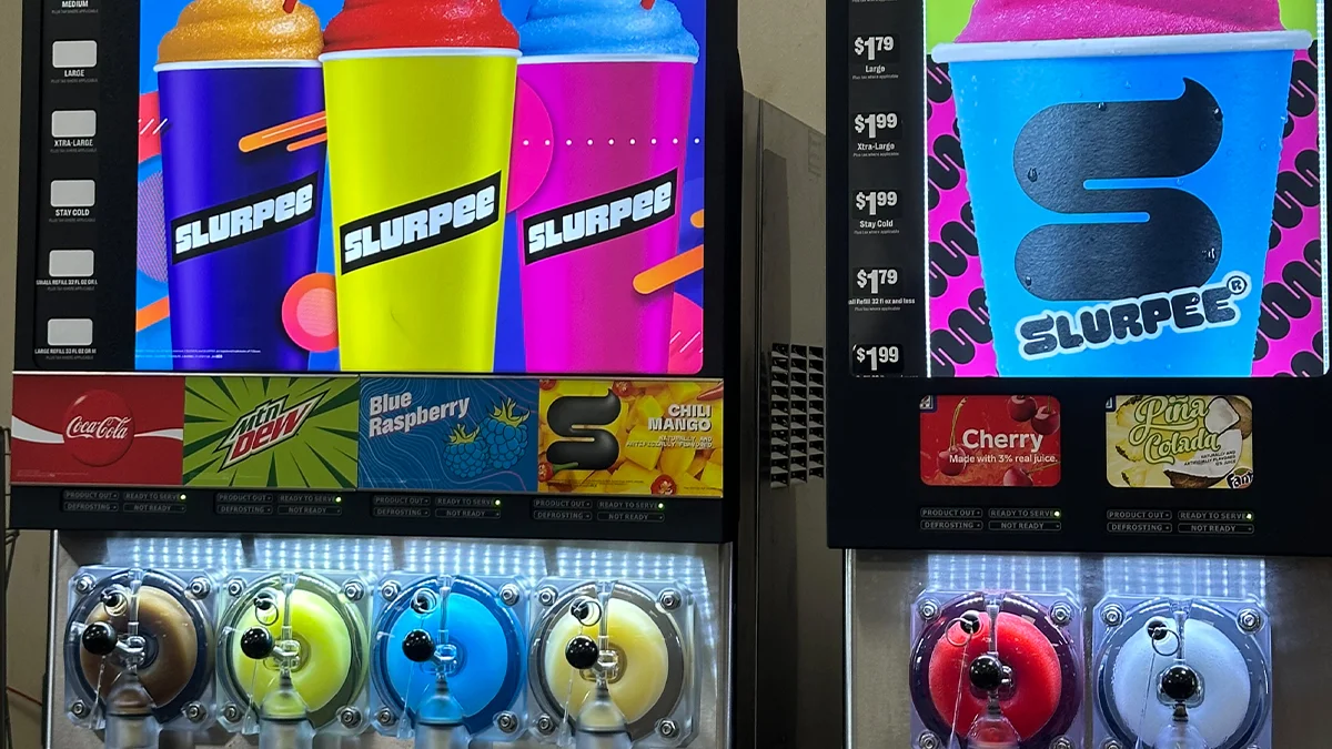 Technician from Rightway A/C & Refrigeration servicing a fountain machine for optimal performance.