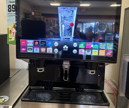 Expert inspecting a fountain machine to ensure reliable operation and maintenance.