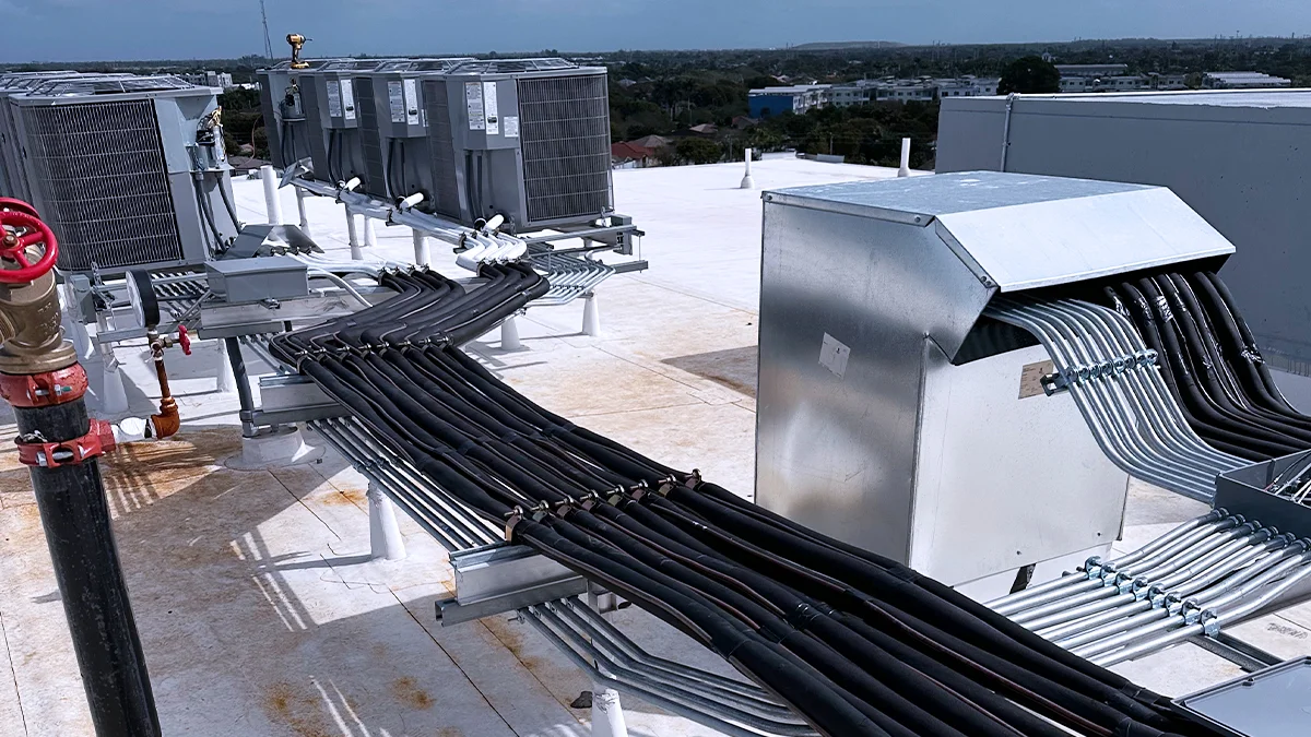 Technician from Rightway A/C & Refrigeration performing precise pipe fitting installation.